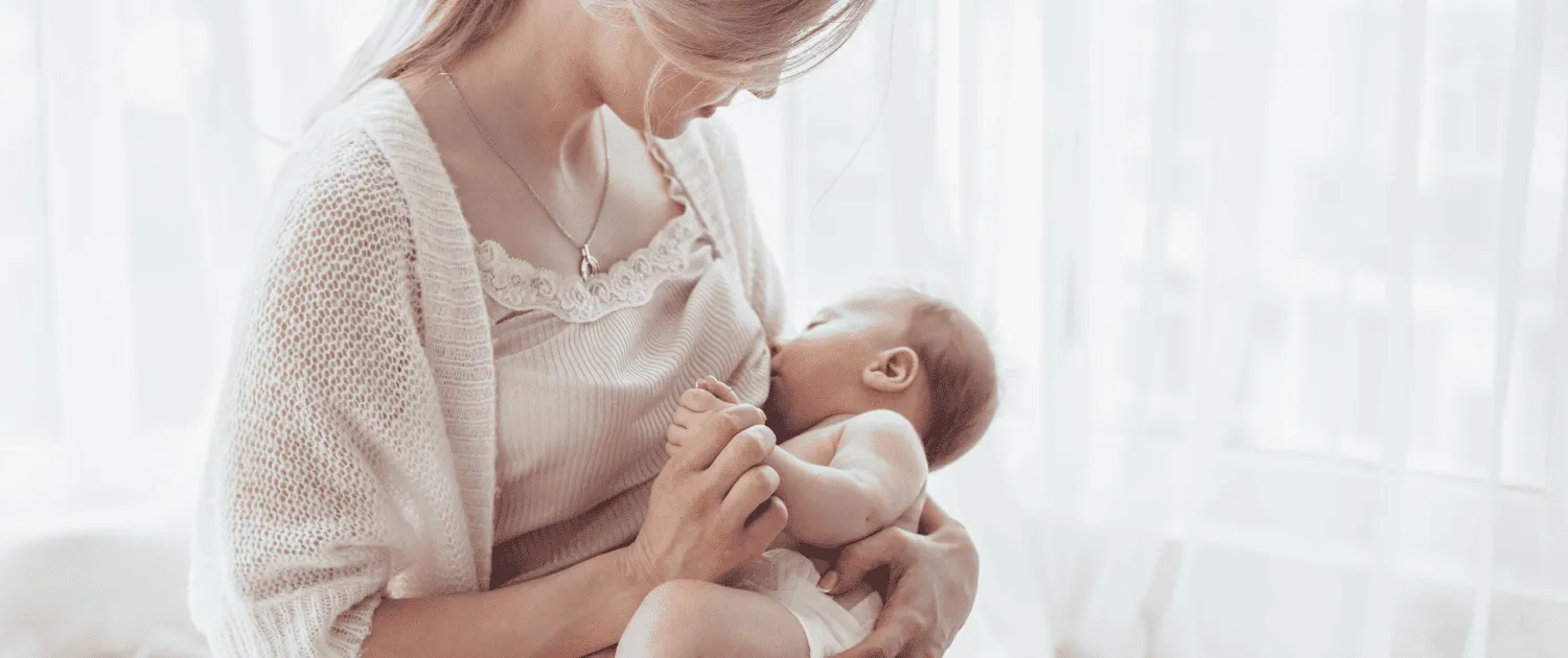 Imagem ilustrativa de uma mãe com seu bebê